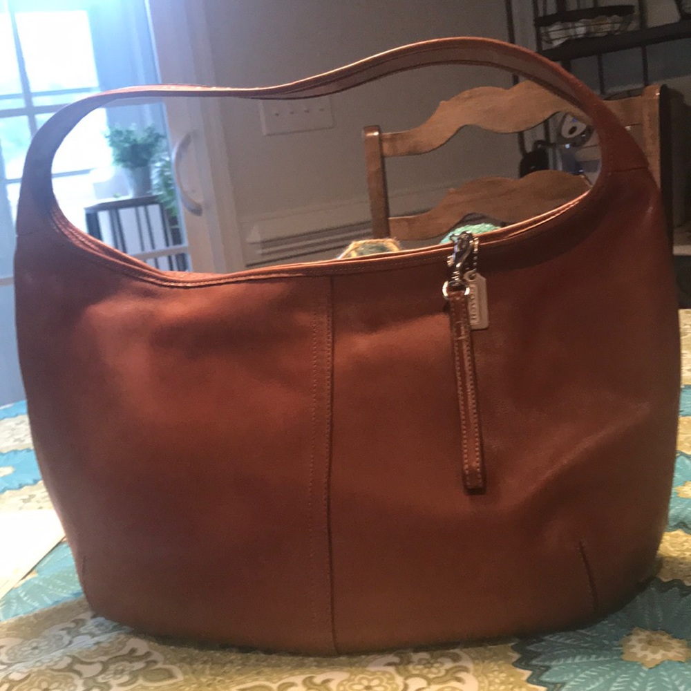 saddle leather coach